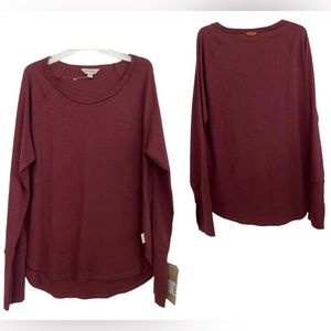 Frye and Co long sleeve burgundy t-shirt has thumb holes in the sleeves.